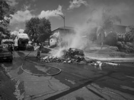 black and white photo of trash fire