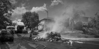 black and white photo of trash fire
