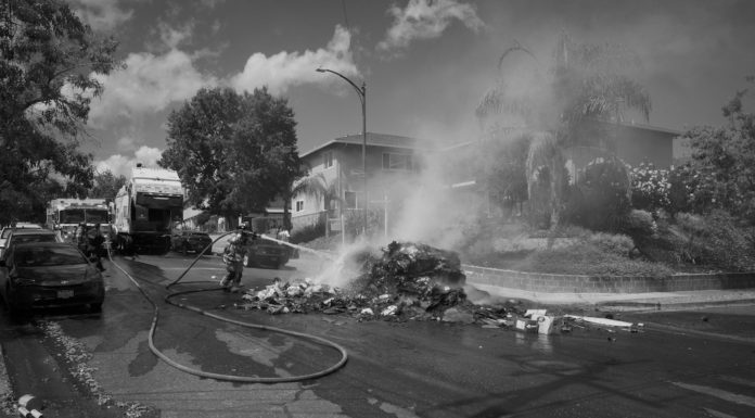 black and white photo of trash fire