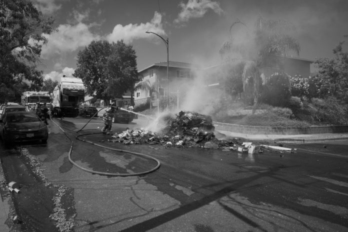 lg.fire (9-8)-2 black and white photo of trash fire