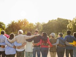 stock image of a bunch of people together looking forward