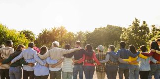 stock image of a bunch of people together looking forward