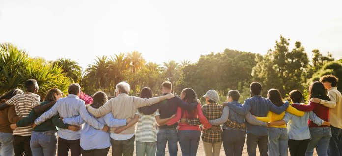 stock image of a bunch of people together looking forward