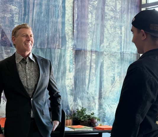 Popular LGHS teacher Kurt Kroesche named parade grand marshal educator named grand marshal of parade speaks with student