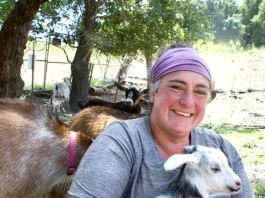 Shoshana Ohriner holds a small goat