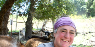 Shoshana Ohriner holds a small goat