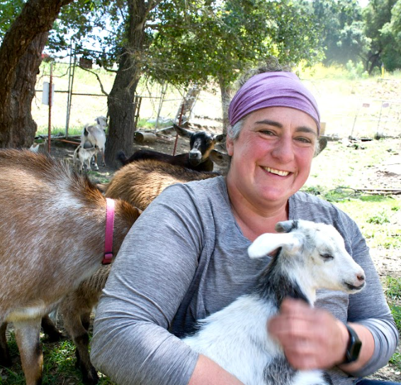Shoshana Ohriner holds a small goat