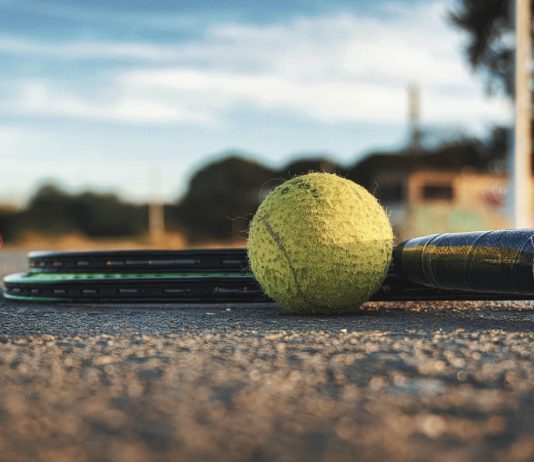 tennis ball and racket