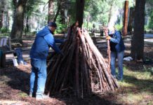 preparing a pile to burn in Big Basin