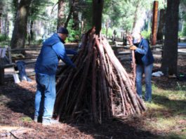 preparing a pile to burn in Big Basin
