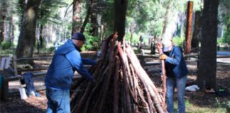 preparing a pile to burn in Big Basin