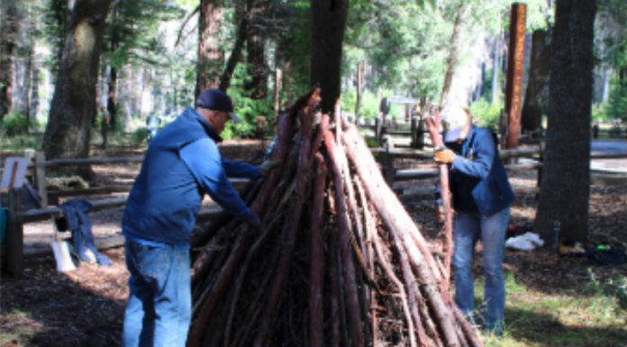 State Parks to burn hundreds of piles in the mountains preparing a pile to burn in Big Basin