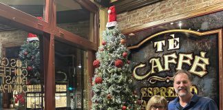 Hope and Phillips by the Xmas tree.