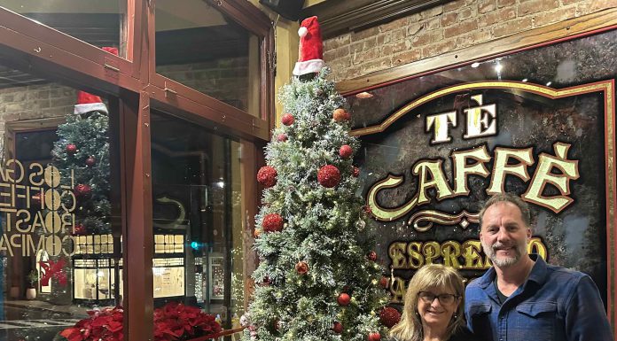 Cafe grateful for outpouring of support after shop partially destroyed; fundraiser reaches goal Hope and Phillips by the Xmas tree.