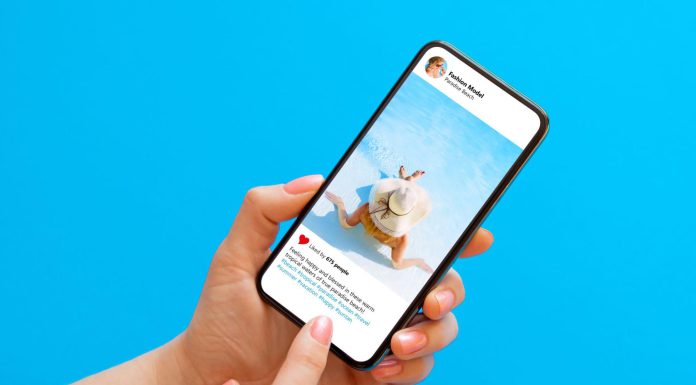 Phone user reading a social media post