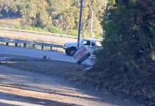 crooked election sign in the Santa Cruz Mountains