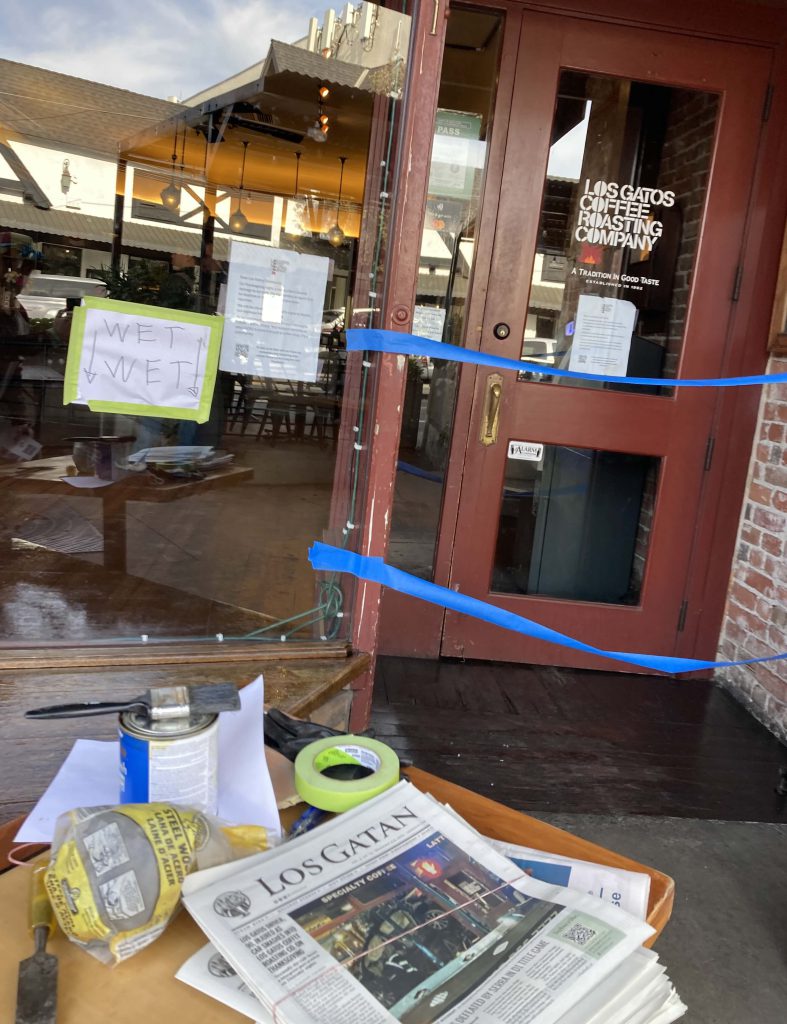 Los Gatan newspaper being distributed outside LGCRC