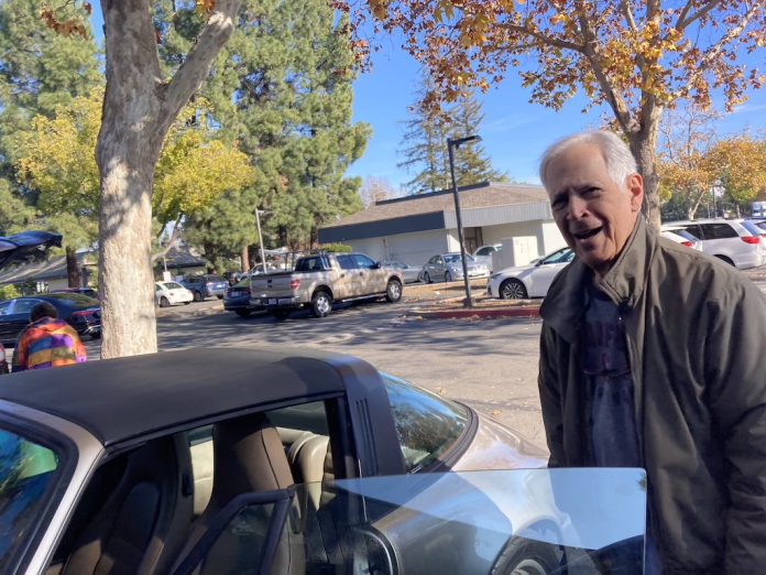 Lon Allan gets into his car in Los Gatos