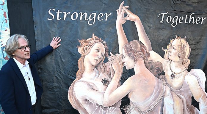 John Robert Peck with temporary mural