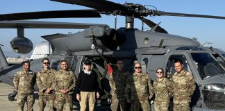 retired major general with troops at the Super Bowl