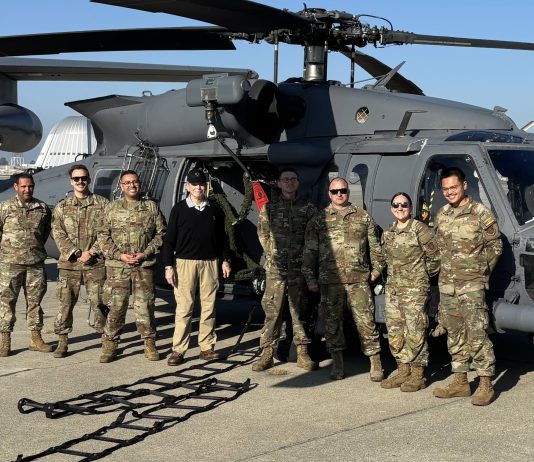 retired major general with troops at the Super Bowl