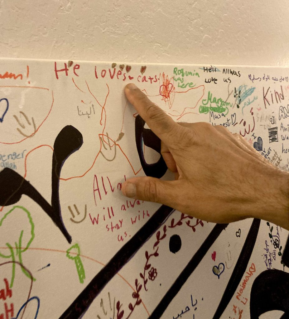 Muhammad loves cats - writing