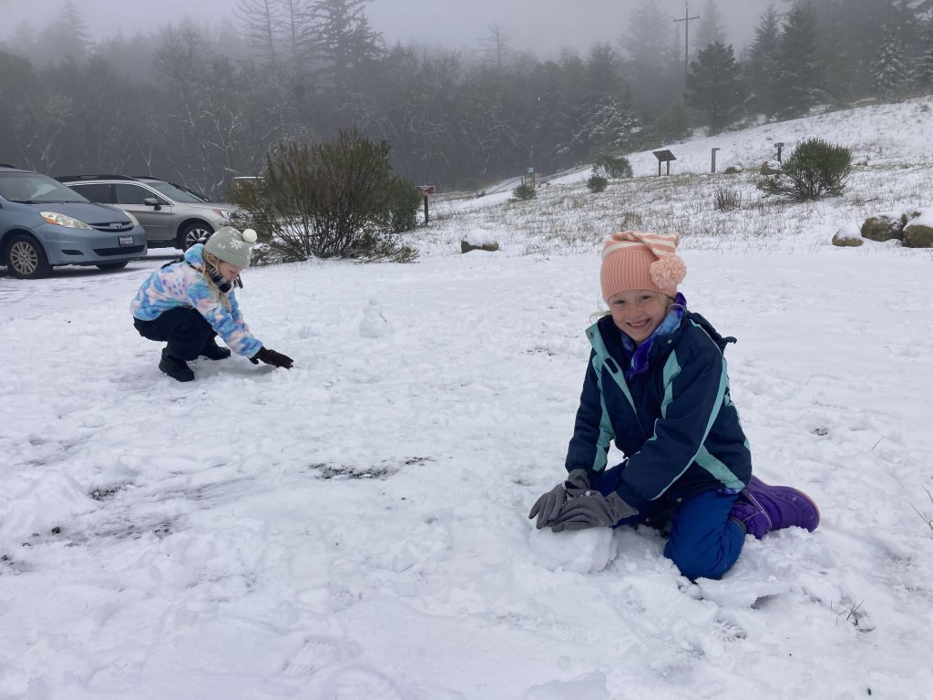 making snowmen at Castle Rock Redwoods State Park