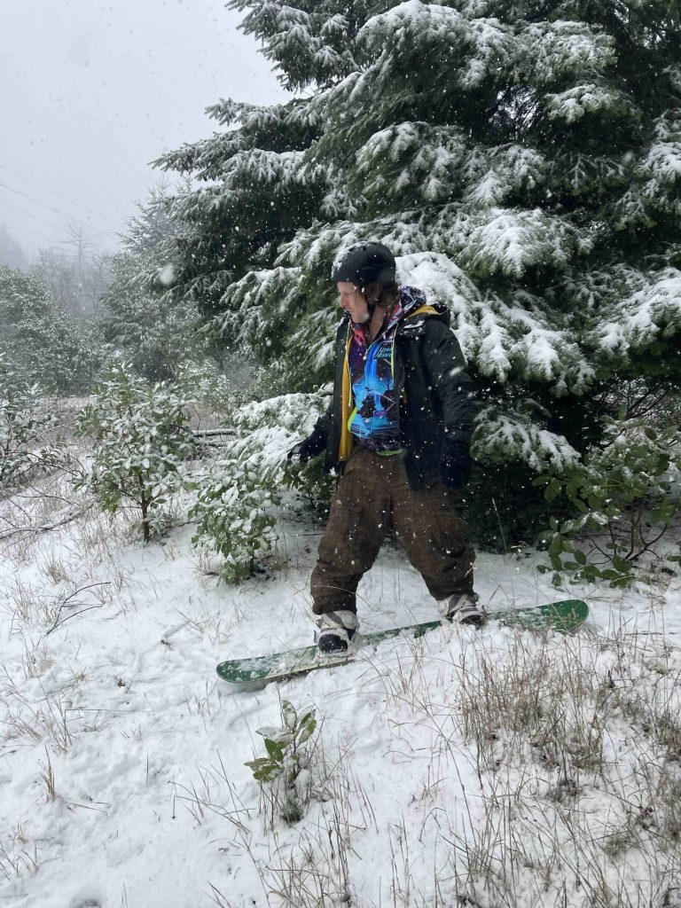 Drew Penner snowboarding