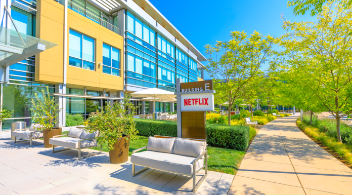 A Netflix building with sign, walkways and landscaping.