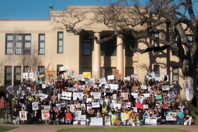 anti-ICE protesters at Los Gatos High on the front steps