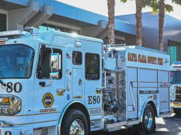 stock image of firetruck in the sunshine