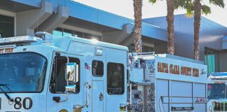 stock image of firetruck in the sunshine