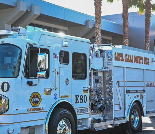 stock image of firetruck in the sunshine