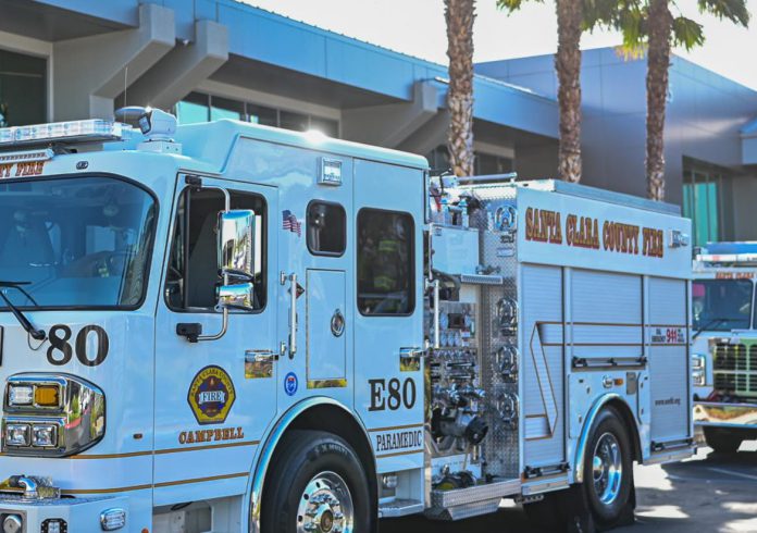 stock image of firetruck in the sunshine
