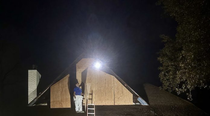 plywood on damaged house
