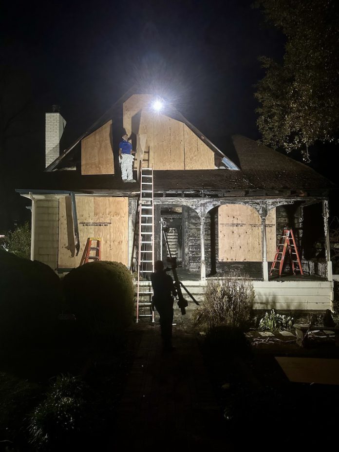 plywood on damaged house
