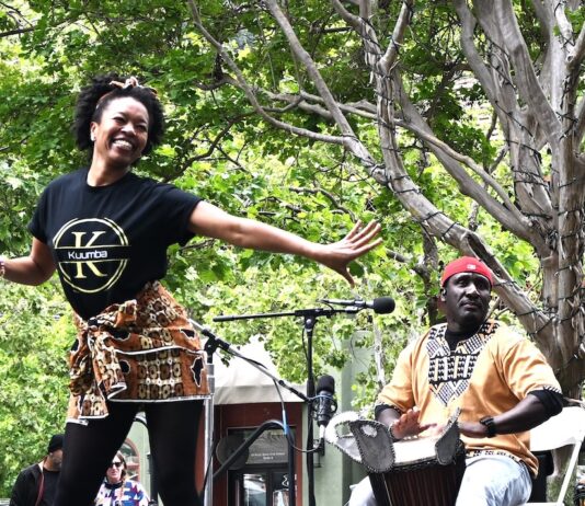 A lively 10th Annual Spring into Green Kuumba dance and music troupe