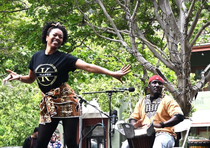 Dancing at Spring into Green Kuumba dance and music troupe