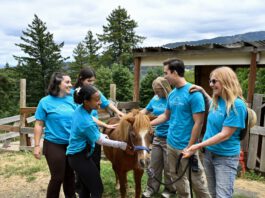 LG Farms counselors with a pony