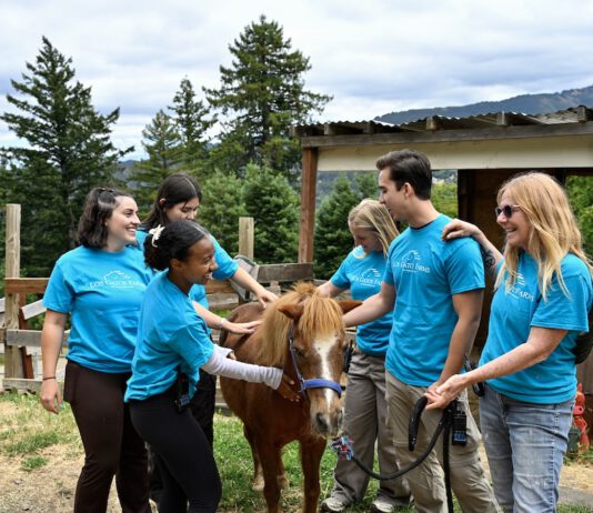 LG Farms counselors with a pony