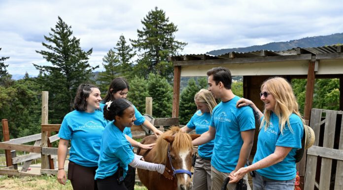 LG Farms counselors with a pony