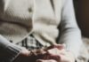 Fraud protection in focus on World Elder Abuse Awareness Day senior clasped hands