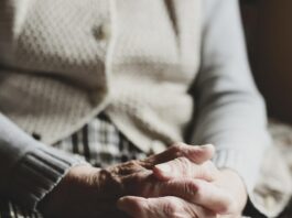 Fraud protection in focus on World Elder Abuse Awareness Day senior clasped hands