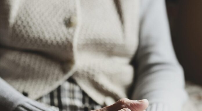 Fraud protection in focus on World Elder Abuse Awareness Day senior clasped hands