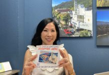 Los Gatos Chamber bets on a gift card to keep dollars downtown Jennifer Lin holds flyer