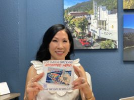 Los Gatos Chamber bets on a gift card to keep dollars downtown Jennifer Lin holds flyer