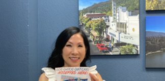 Jennifer Lin holds flyer