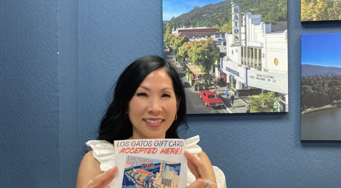 Jennifer Lin holds flyer