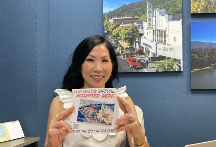 Jennifer Lin holds flyer