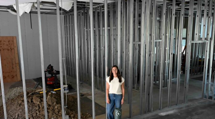 Melissa Mancini amid construction